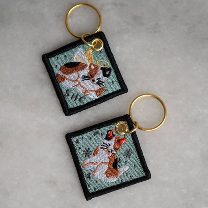 Duality Cat Double-Sided Embroidered Keychain